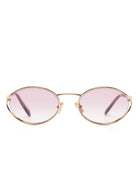 Miu Miu MU52YS 5AK06S oval fraame gold sunglasses with logo details - Chris Optics